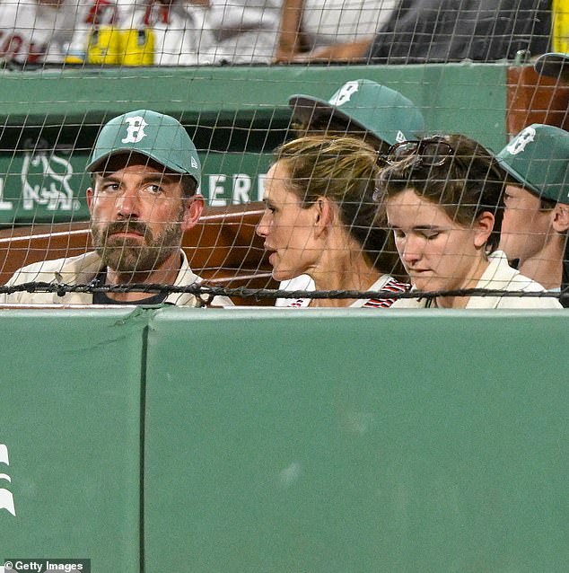The family held lighthearted conversations during the family outing - and at one point, also appeared on a jumbotron inside the ballpark