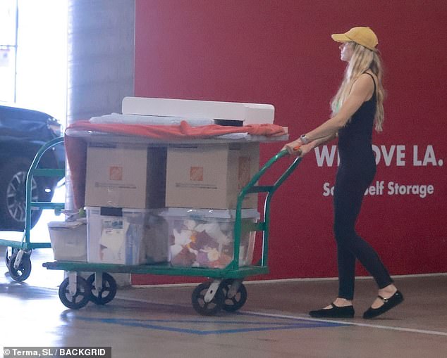 Jess also loaded smaller items and boxes onto a large trolley to transport through the facility