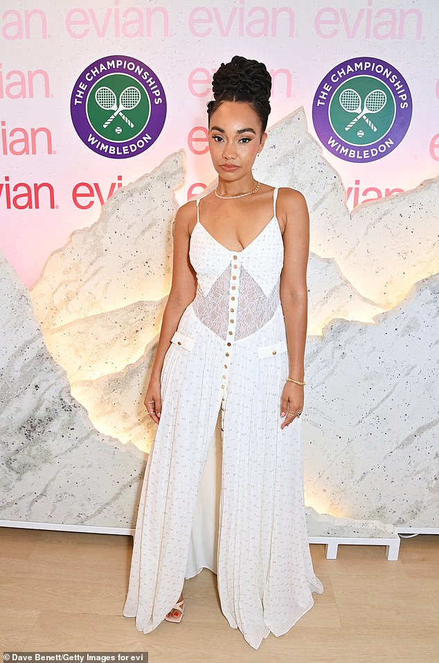 Little Mix star Leigh-Anne Pinnock looked stunning in a plunging white summer dress with a high front slit and lace mid driff detailing