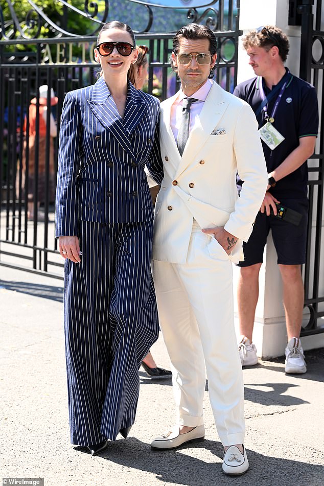 She was also joined by her husband Ned Wolfgang who looked dapper in a cream summer suit