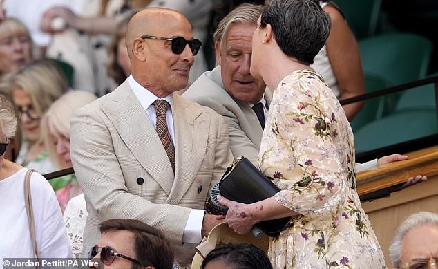 The American actor, 64, was seen greeting another spectator as they sat together