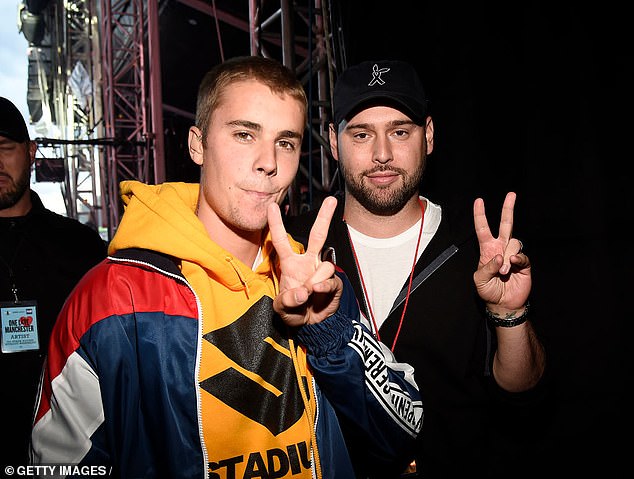 The pair have finally reached a settlement agreement that will reportedly cost Bieber over $30million, according to TMZ; seen in 2017 in Manchester