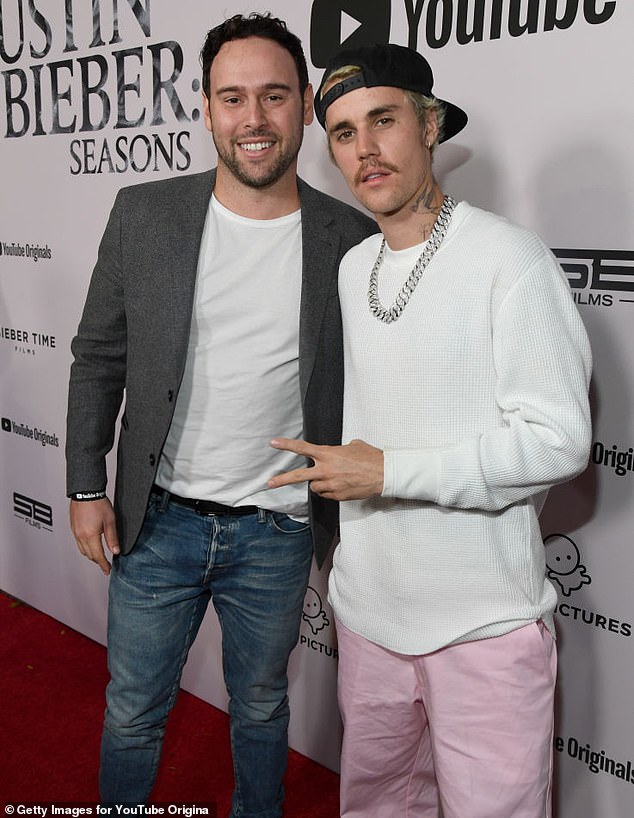 He concluded the message by encouraging his followers to give the Swag album a listen and to 'support an authentic voice'; seen in 2020 in Westwood