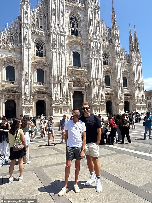 The Aussie swimmer (right) was seen with Paras Cladakis (left) while in Milan