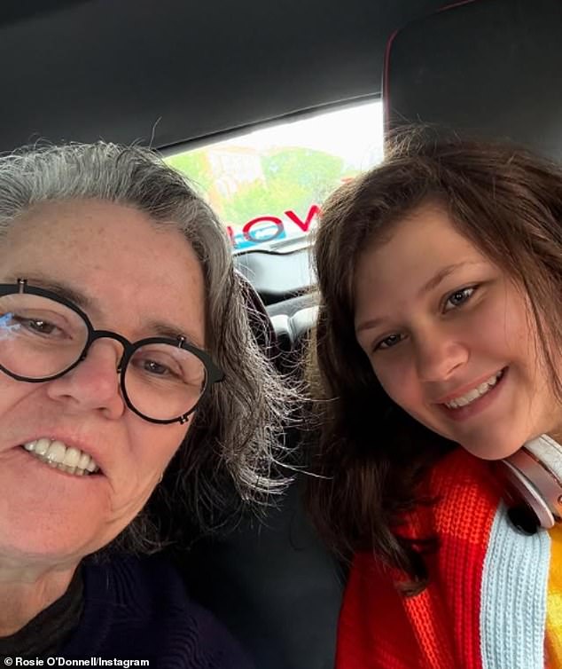 Meanwhile, Rosie and her child Dakota 'Clay' O'Donnell (R, pictured last Tuesday) are getting acclimated to Dublin and she's 'in the process' of getting Irish citizenship