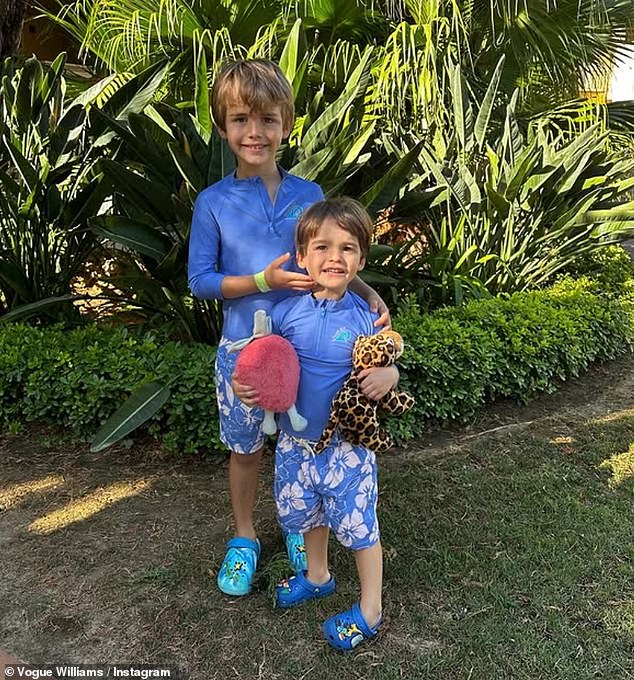 Alongside her holiday post, she penned: 'I’ve counted down the days until we got here' (pictured: Theodore, left, and Otto, right)