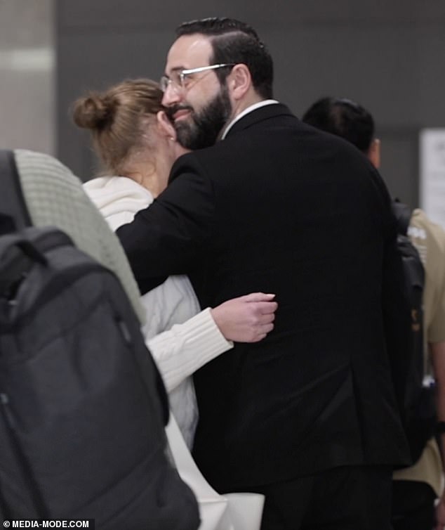 Jelena was seen exiting her flight and grinning broadly as she accepted a warm embrace from the bearded man as she entered the terminal