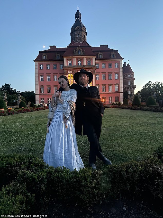 With the film focusing on the life of Dostoyevsky, played by Michał Englert, Aimee posed with her on-screen husband outside a mansion