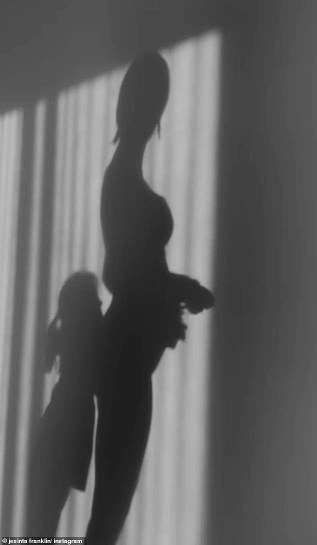 In a candid video, Jesinta shared a silhouette of herself cradling her growing baby bump while her two children, daughter Tullulah, five, and son Rocky, four, played around her