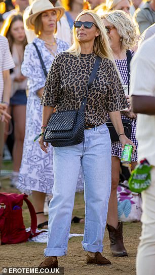 Louise kept comfortable in a pair of brown loafers to complete her look