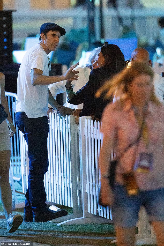Comedian Sacha, 53, was also in attendance and was seen having a chat with some friends as he cut a low-profile at the festivities