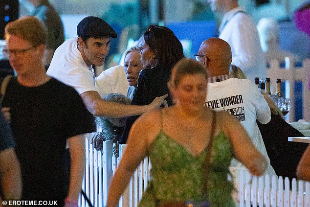 Sacha, who recently finalised his divorce from Isla Fisher, appeared in good spirits during the outing