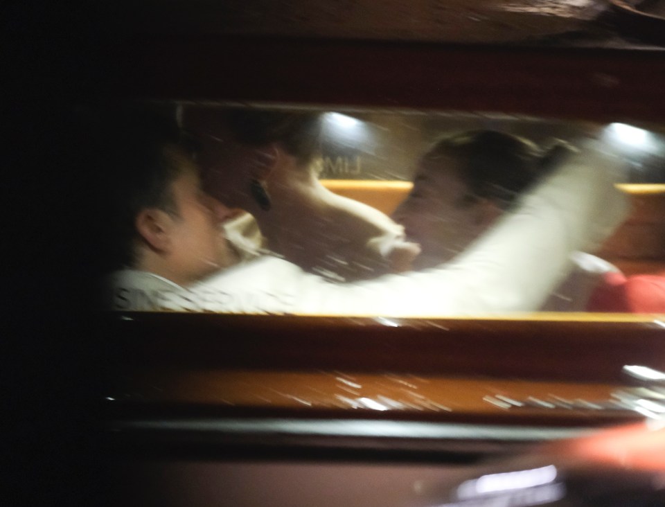 Orlando Bloom leaving a party in a water taxi.