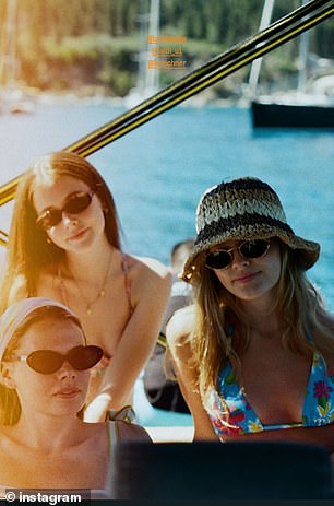 Images showed the pals enjoying a summer vacation together, with Sunday sunbathing waterside while wearing a hat over her face