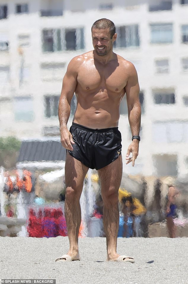 While former Made In Chelsea star Spencer , 36, gave his wife a run for her money, as he showed off his ripped physique and six-pack in black swimming trunks