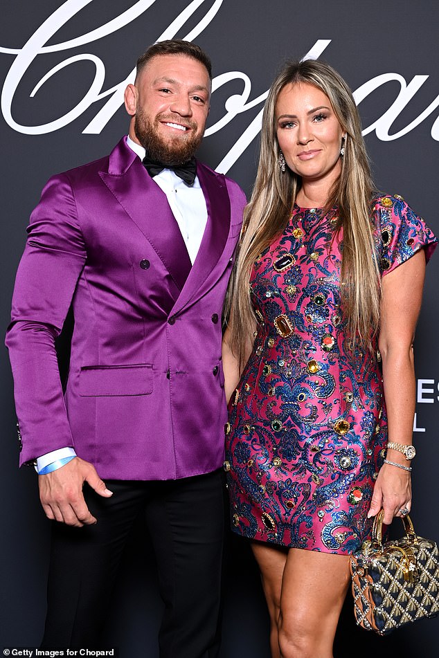 Conor was also spotted 'liking' an Instagram post condemning him for playing away behind his fiancee Dee Devlin's back (pictured with Dee in 2022)