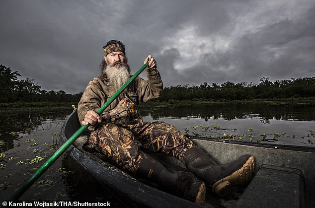 He then expressed gratitude that his mother is able to have 'brighter days' but admitted not having his father around has left 'a big void'; Phil seen in season four of Duck Dynasty