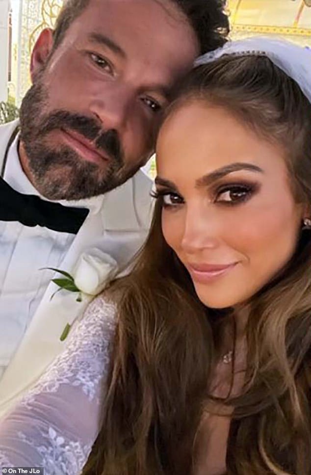 After reading the note aloud in her hand-held microphone, she answered, 'I think I’m done with that. Yeah, I tried that a few times,' while shaking her head; pictured with then-husband Ben in 2022