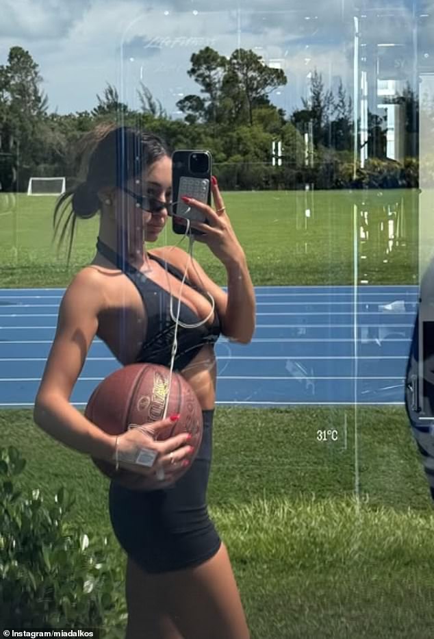 She also shared a photo, prior to the clip, that showed her standing in front of a gym holding a basketball – also coincidentally another sport for which Nick has displayed a passion