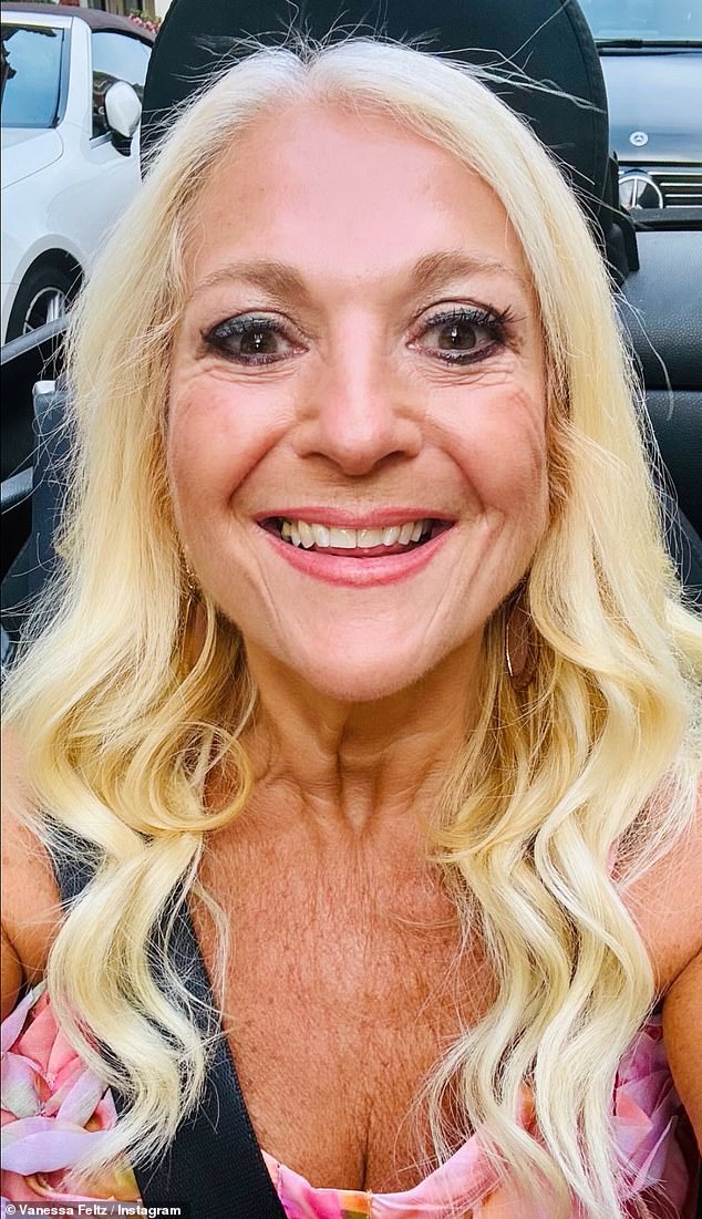 She added a pair of sparkly silver heels and styled her hair into loose curls to pose for some photos for Instagram