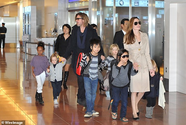 Jolie, 50, shares six children with ex-husband Pitt: Maddox, 23, Pax, 21, Zahara, 20, Shiloh, and 17-year-old twins Knox and Vivienne; (seen in  2011)