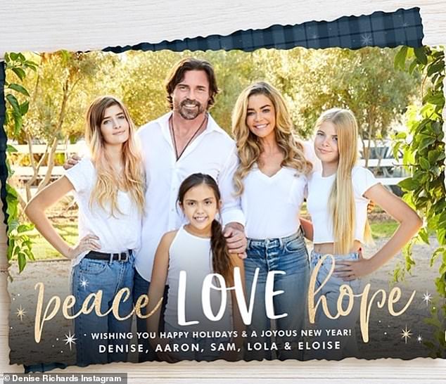 Denise has two children from her previous marriage to Charlie Sheen - Sami, 21, (far left) and Lola, 20 (far right) - and she adopted Eloise, 14, in 2011 (in front)