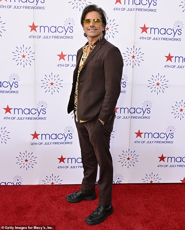 Denise and John Stamos of Full House fame casually dated after her split from Charlie; seen in NYC on 4th of July