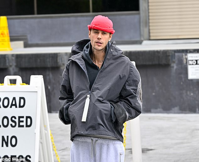 However, TMZ's sources say Braun is willing to settle the debt for 'pennies on the dollar,' which could be a major break for Bieber; seen in April in L.A.