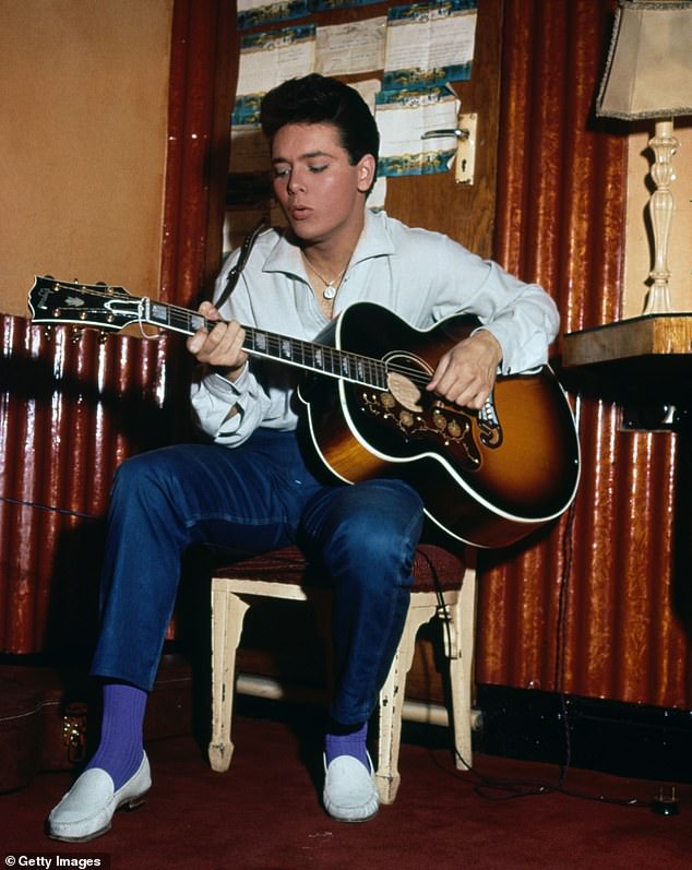 Sir Cliff, who was awarded his knighthood in 1995, has an epic back catalogue which includes more than 50 studio and live albums (pictured 1965)