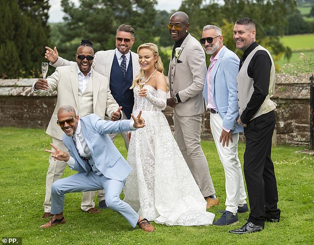 Guests including Boyzone stars Keith Duffy (third from left) toasted the newlyweds with filled-to-the-brim flutes of £33-a-bottle Jean-Noel Heritage Champagne