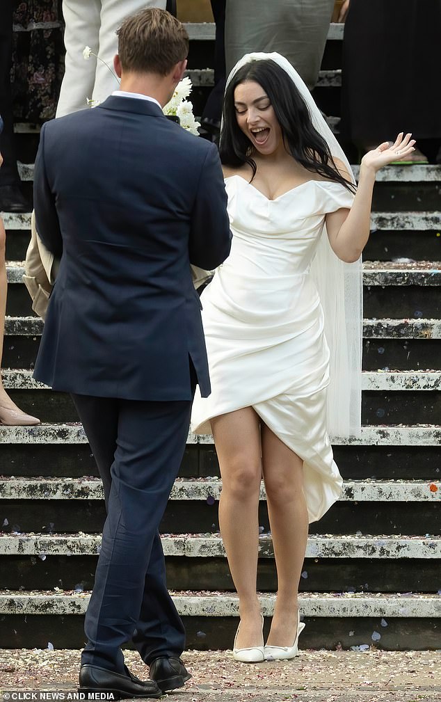 The party girl danced with pals outside the venue