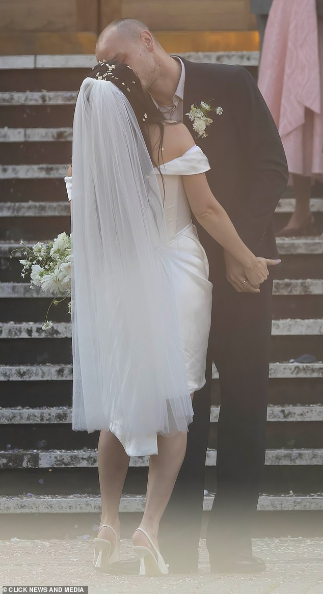 The newlyweds could not keep their hands off each other
