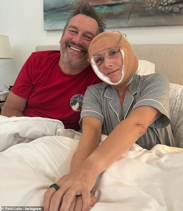 One of the photos showed her sitting in bed with her head bandaged, cuddling up to her 'sweet' third husband, lawyer Ross Burningham