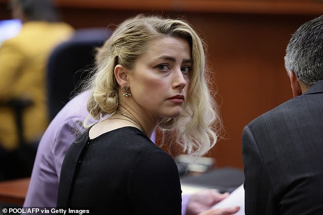 Unless a settlement could be reached, Amber and Johnny would be headed to court in Virginia. Pictured: Amber at the defamation trial in 2022