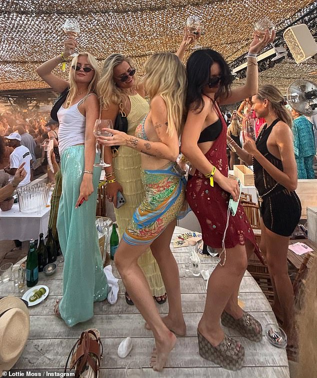 In one snap, the former Only Fans content creator (pictured dancing with friends) stunned in a gorgeous Bydee bikini in Zephyrus print, which she paired with a matching beach skirt