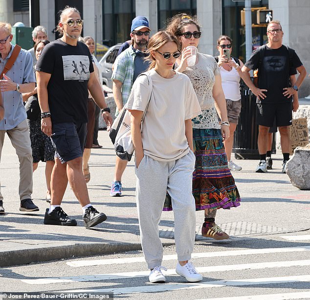 The 44-year-old Oscar winner looked comfy in a beige T-shirt, grey sweatpants, and white Keds 'Champion Canvas Lace-Up' sneakers