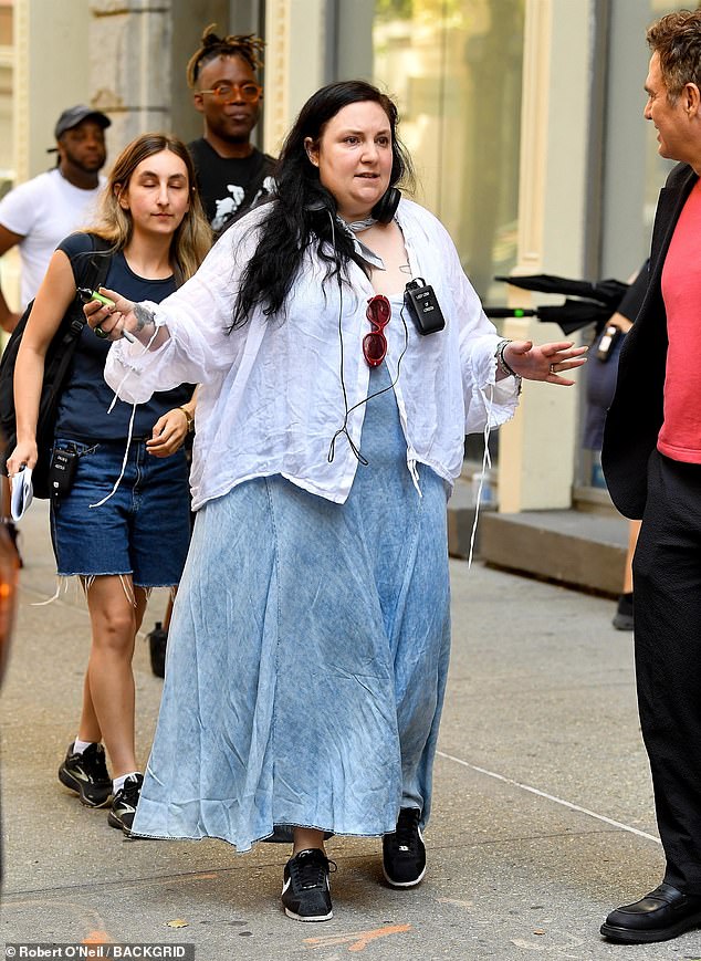 The four-time Oscar nominee (R) could be seen walking and talking with Dunham as they headed to the set