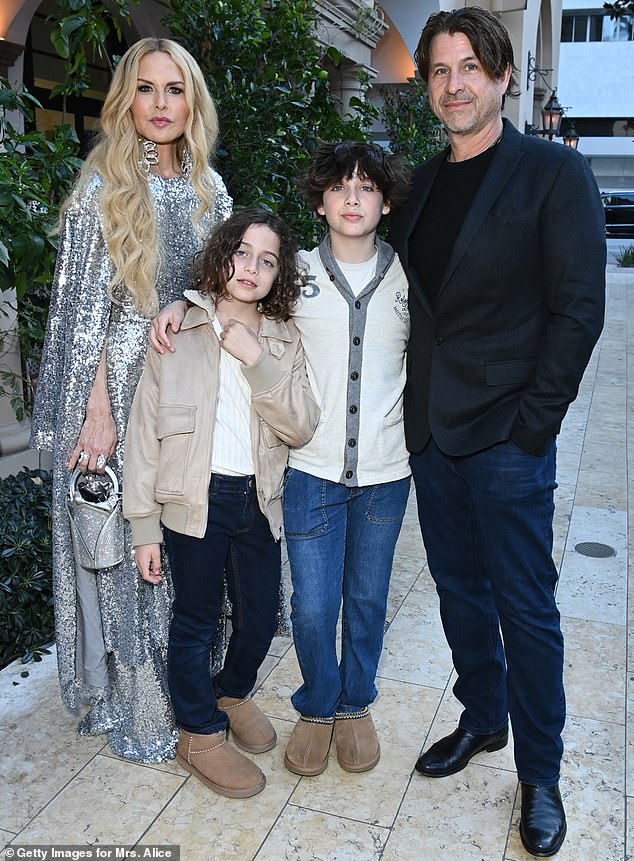 The former couple share two sons, Skyler, 14, and Kaius, 11, whom they are pictured with in March 2024, three months before their listed date of separation