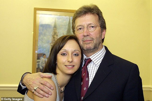 The pregnancy announcement comes more than three decades after Ruth was thrust into the spotlight as the ‘secret daughter’ of Eric Clapton (pictured with Clapton in 2003)