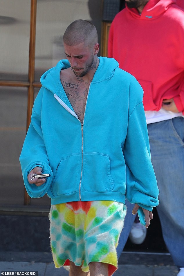 His wife, Hailey, 28, did not join him for the outing, after he seemingly laid bare their marriage struggles in the emotional lyrics of his new album