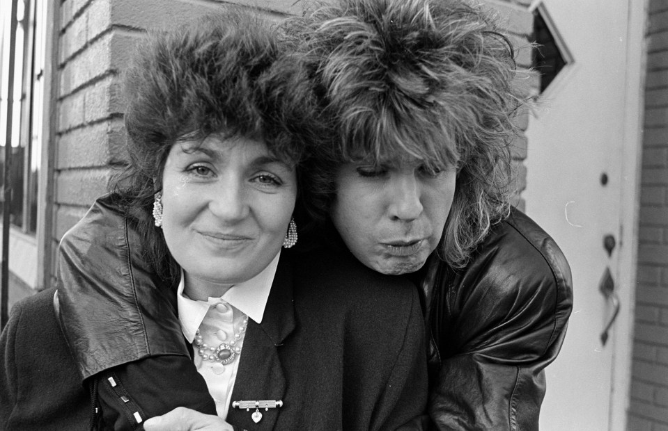 Black and white photo of Ozzy and Sharon Osbourne.