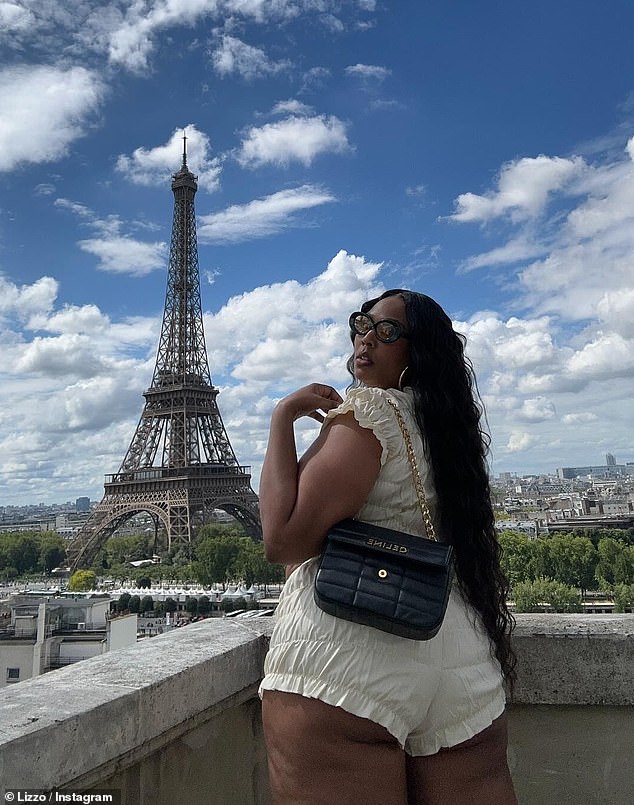 This time, the About Damn Time singer donned a skimpy cream ruffled crop top and matching shorts while posing in front of the Eiffel Tower