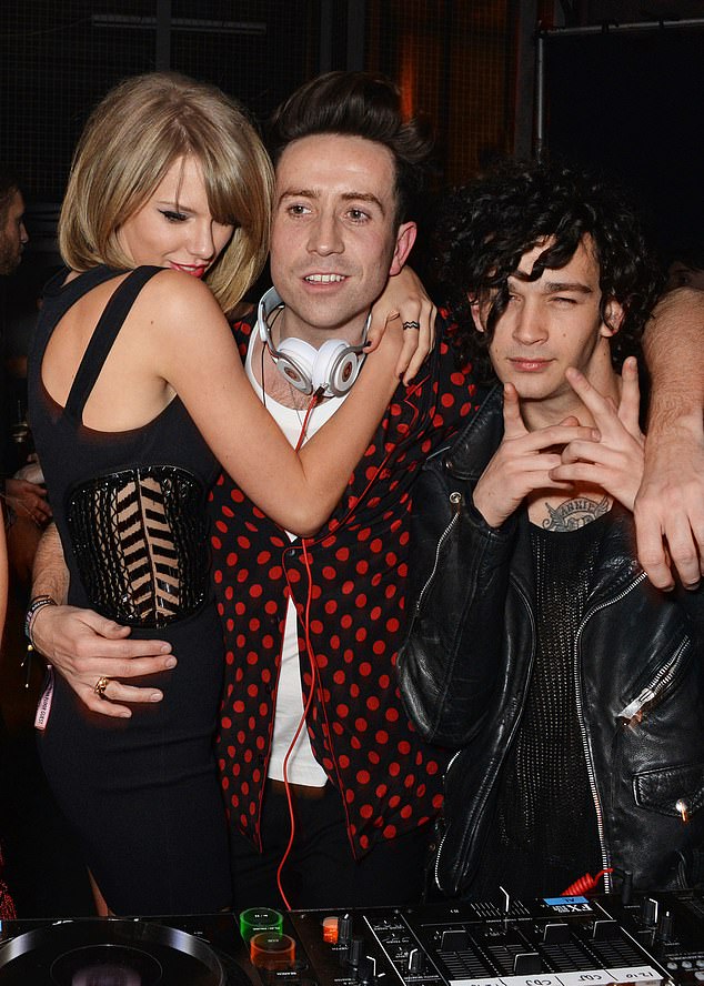 Swift and Healy first met in 2014 after she attended a 1975 concert, but they didn't come back into each other's orbit until 2022, when they worked on an ill-fated song for her Midnights album that was left unreleased; seen with Grimshaw (center) in 2015 in London