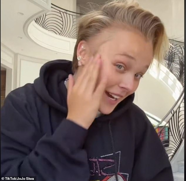 'Stress rash on my head when I was on Dance Moms led to no more hair there,' she captioned the clip