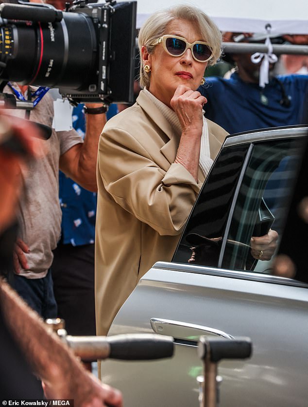 Meanwhile Meryl was spotted in her unmistakable 2006 Miranda Priestly look, complete with the character's swirl of ice-white hair