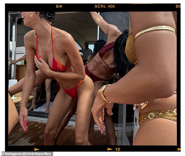 The women danced in their swimsuits as they laughed