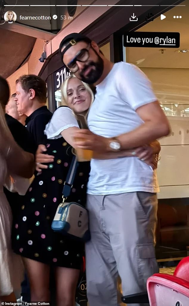 Newly-single Fearne, who split from her husband Jesse Wood earlier this year, enjoyed a hug with pal Rylan as they posed for a snap together