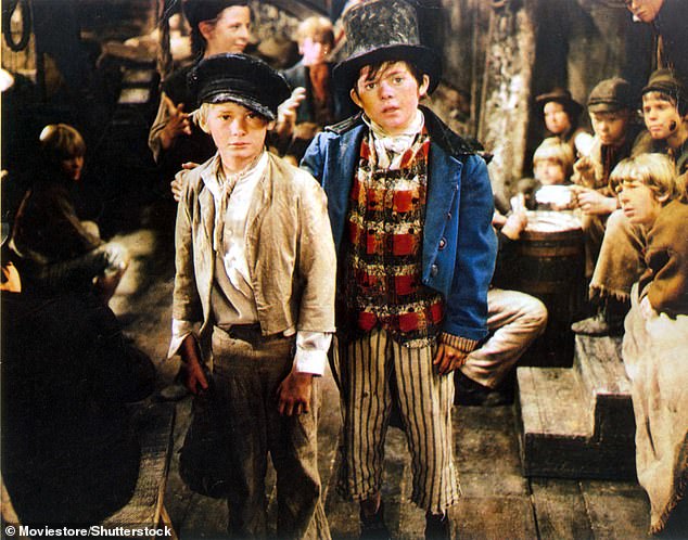 Mark Lester (left) played Oliver alongside Wild (right) in the hit film adaptation of Charles Dickens' classic novel Oliver Twist