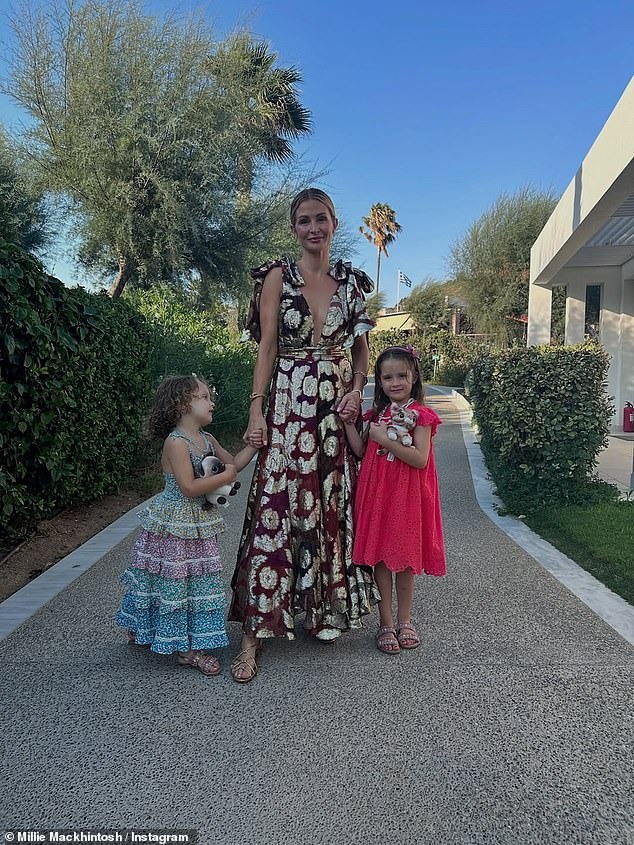 She was joined by her daughters Sienna and Aurelia as they sang happy birthday and watched their mum blow out candles