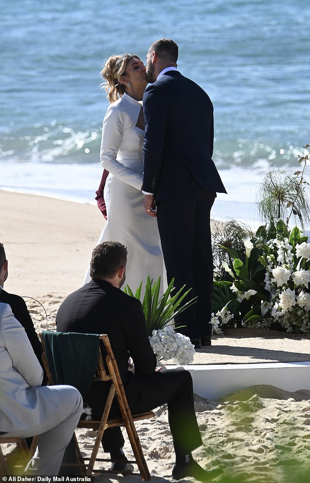 The genetically blessed duo sealed the deal with a kiss